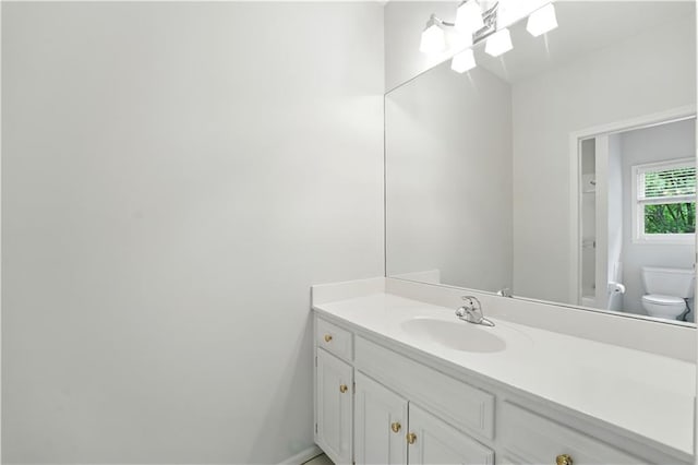 13905 Lucille St, Overland Park, KS 66221 - bathroom featuring toilet and vanity