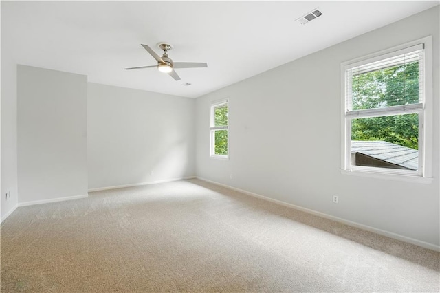 13905 Lucille St, Overland Park, KS 66221 - unfurnished room with a ceiling fan and light carpet