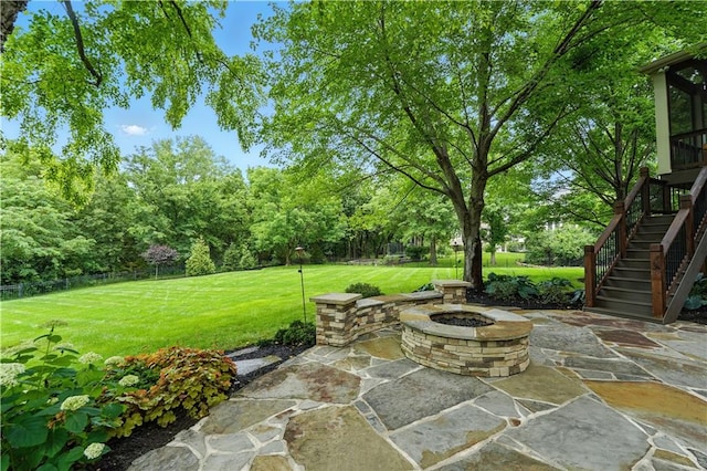 13905 Lucille St, Overland Park, KS 66221 - view of patio featuring an outdoor fire pit, stairs, and view of scattered trees