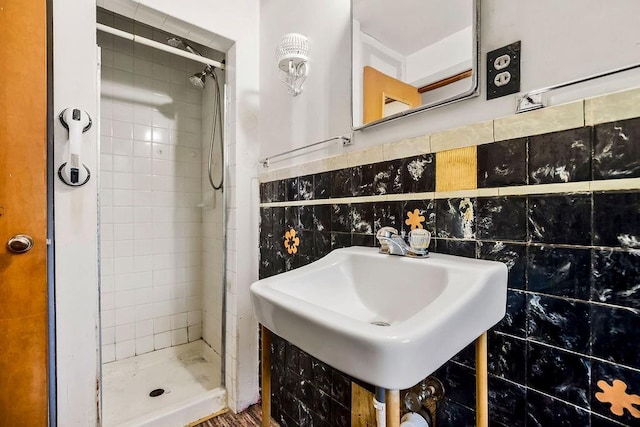 1036 Vilas St, Leavenworth, KS 66048 - full bath featuring a stall shower, tile walls, and a sink
