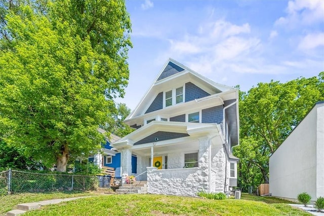 1316 E 42nd St, Kansas City, MO 64110 - view of front facade featuring covered porch