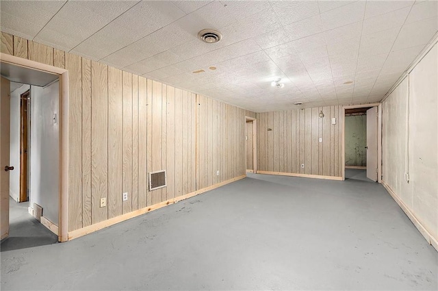 501 Maple Ave, Smithville, MO 64089 - finished basement featuring wooden walls and baseboards