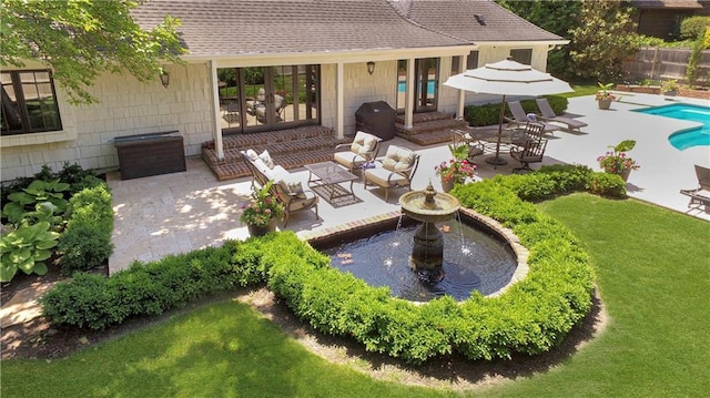 2210 W 69th Ter, Mission Hills, KS 66208 - view of patio featuring area for grilling and an outdoor living space
