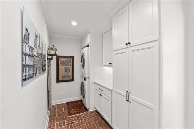 2210 W 69th Ter, Mission Hills, KS 66208 - laundry room with stacked washer / dryer, brick patterned flooring, crown molding, baseboards, and recessed lighting