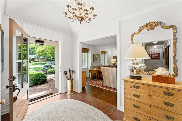 2210 W 69th Ter, Mission Hills, KS 66208 - entryway with a chandelier, brick patterned floors, and french doors