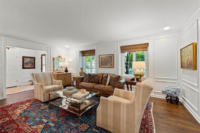 2210 W 69th Ter, Mission Hills, KS 66208 - living area with a decorative wall, dark wood-style floors, and recessed lighting