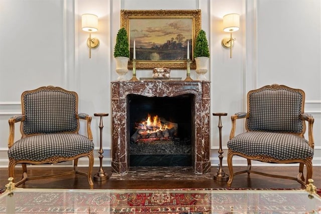 2210 W 69th Ter, Mission Hills, KS 66208 - living area with a high end fireplace and baseboards