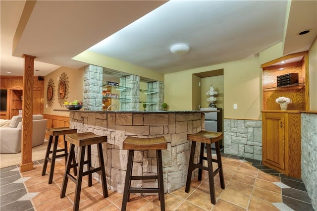 13011 Long St, Overland Park, KS 66213 - indoor wet bar featuring ornate columns and wainscoting