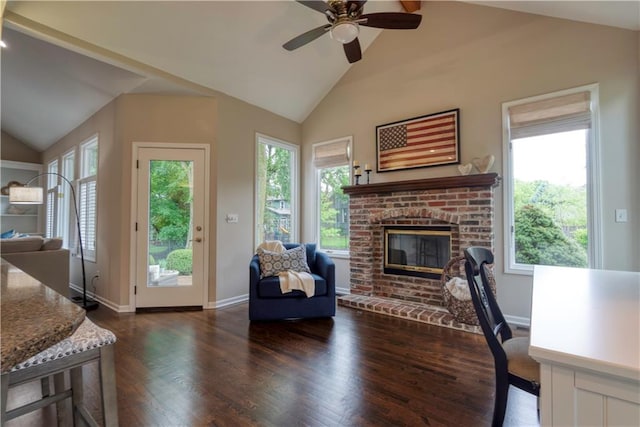 13011 Long St, Overland Park, KS 66213 - living room with a fireplace, dark wood finished floors, ceiling fan, baseboards, and high vaulted ceiling