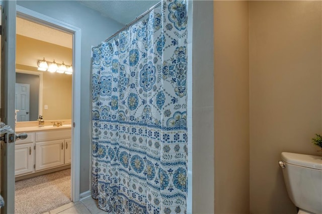 13011 Long St, Overland Park, KS 66213 - full bath featuring vanity, toilet, and a shower with shower curtain
