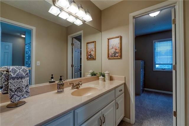 13011 Long St, Overland Park, KS 66213 - bathroom featuring vanity and baseboards