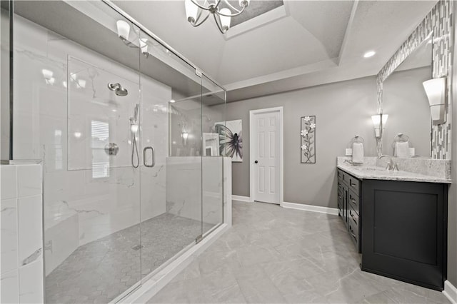 14450 W 146th Ter, Olathe, KS 66062 - full bath with vanity, a marble finish shower, baseboards, marble look tile flooring, and a tray ceiling
