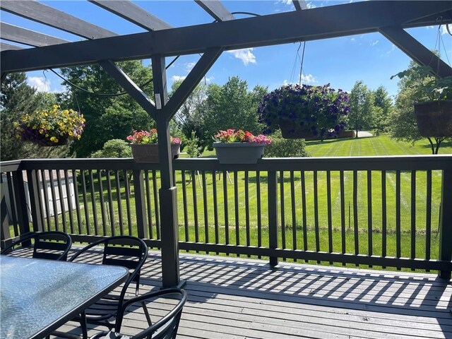 1211 N 6th St, Hiawatha, KS 66434 - wooden terrace featuring a pergola and a yard