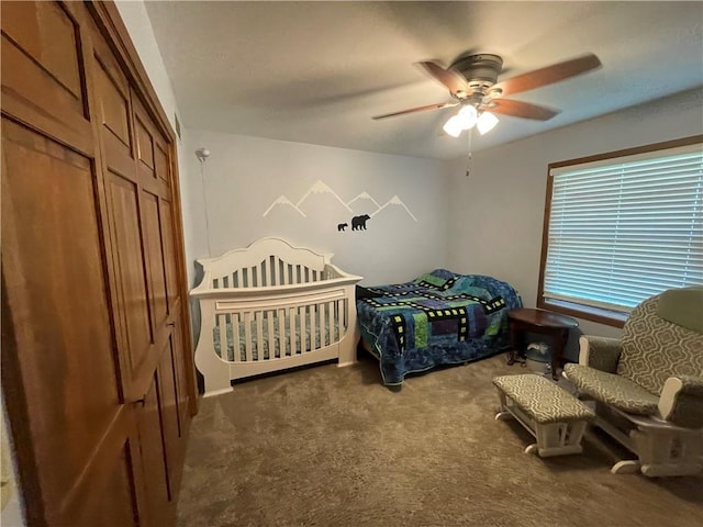 1211 N 6th St, Hiawatha, KS 66434 - carpeted bedroom with a ceiling fan