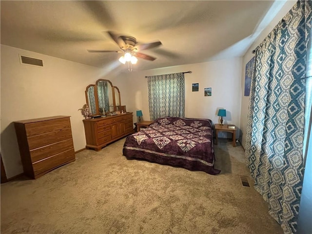 1211 N 6th St, Hiawatha, KS 66434 - bedroom with light carpet and ceiling fan