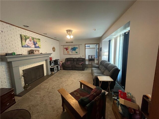 1211 N 6th St, Hiawatha, KS 66434 - living room with brick wall, carpet, and a brick fireplace