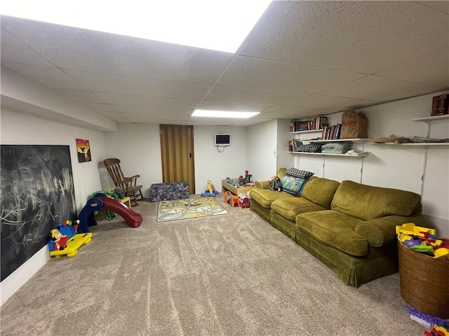 1211 N 6th St, Hiawatha, KS 66434 - carpeted living area featuring a drop ceiling