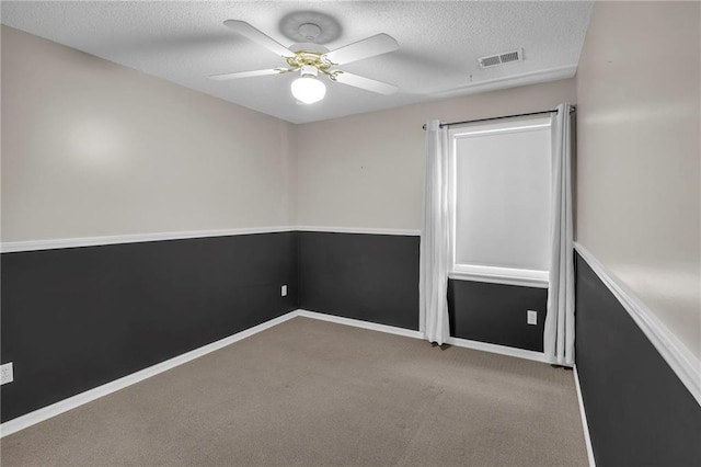 12726 S Rene St, Olathe, KS 66062 - empty room with carpet floors, a ceiling fan, a textured ceiling, and baseboards