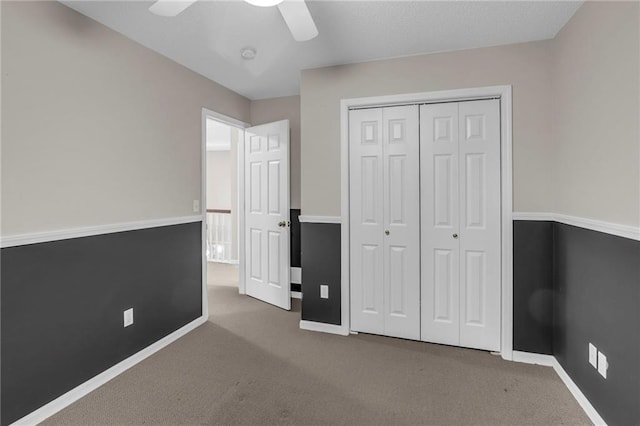 12726 S Rene St, Olathe, KS 66062 - unfurnished bedroom featuring carpet flooring, a closet, baseboards, and ceiling fan