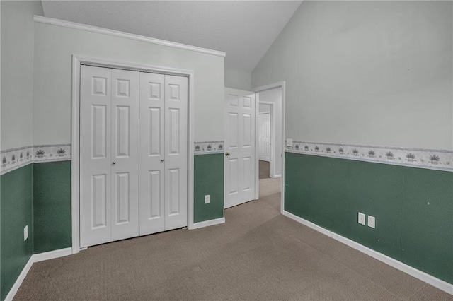 12726 S Rene St, Olathe, KS 66062 - unfurnished bedroom featuring carpet, lofted ceiling, ornamental molding, a closet, and baseboards