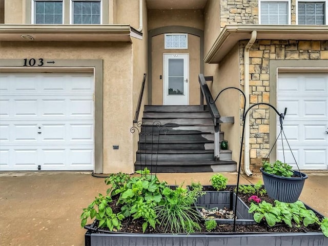 1151 N Mart-Way Dr Unit 103, Olathe, KS 66061 - entrance to property with stucco siding, stone siding, and a garage
