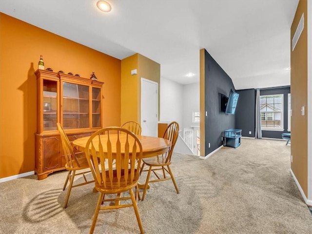 1151 N Mart-Way Dr Unit 103, Olathe, KS 66061 - dining area featuring carpet floors, baseboards, and recessed lighting