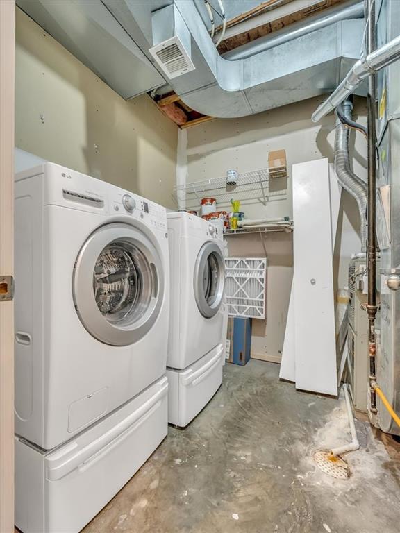 1151 N Mart-Way Dr Unit 103, Olathe, KS 66061 - laundry room with independent washer and dryer