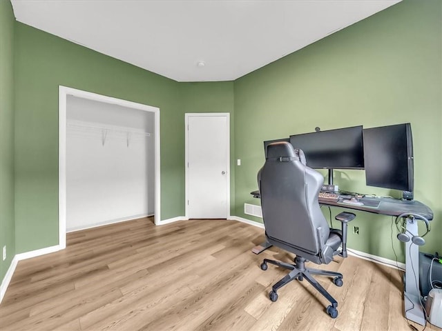 1151 N Mart-Way Dr Unit 103, Olathe, KS 66061 - office area featuring wood finished floors and baseboards