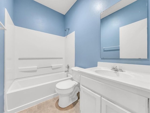 1151 N Mart-Way Dr Unit 103, Olathe, KS 66061 - bathroom featuring vanity, bathing tub / shower combination, toilet, and tile patterned flooring