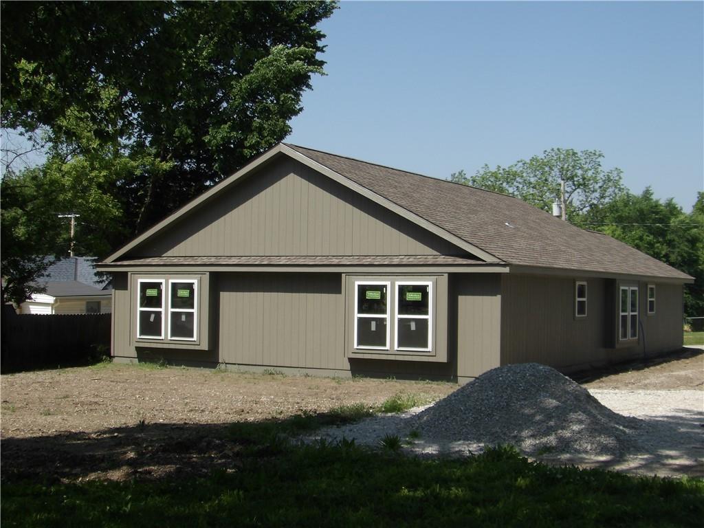 303 S Lexington St, Holden, MO 64061 - view of front of house with a shingled roof