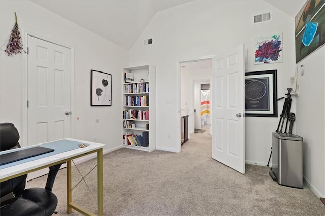 8443 Mettee St, Lenexa, KS 66219 - office area with lofted ceiling, light colored carpet, baseboards, and built in shelves