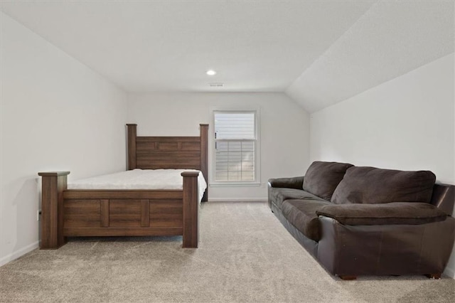 8443 Mettee St, Lenexa, KS 66219 - bedroom with light colored carpet, lofted ceiling, and baseboards