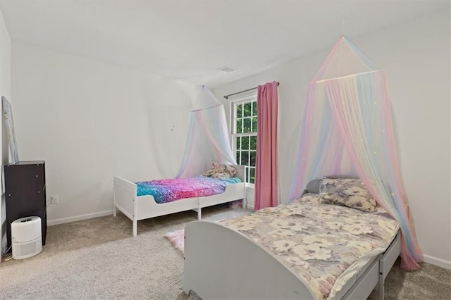 8443 Mettee St, Lenexa, KS 66219 - carpeted bedroom featuring baseboards