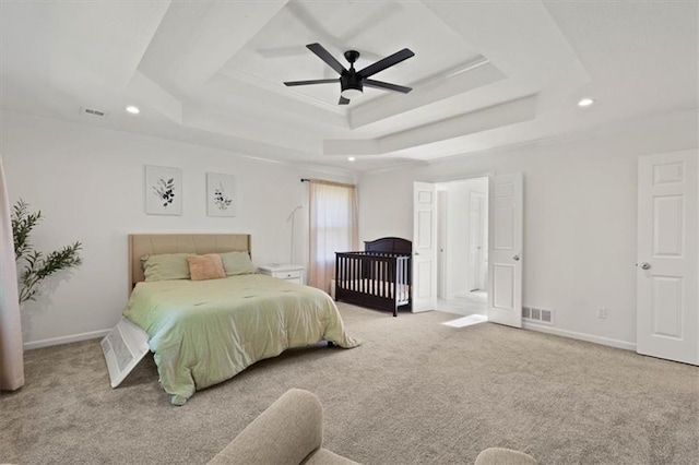 8443 Mettee St, Lenexa, KS 66219 - bedroom with a raised ceiling, recessed lighting, carpet flooring, a ceiling fan, and ornamental molding