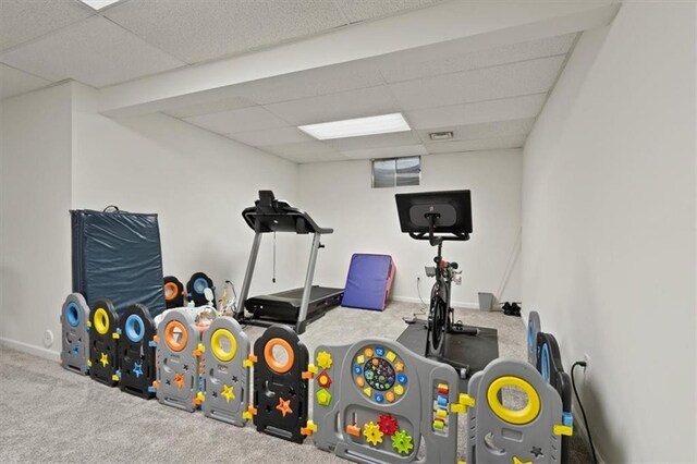 8443 Mettee St, Lenexa, KS 66219 - workout room featuring carpet floors, a drop ceiling, and baseboards