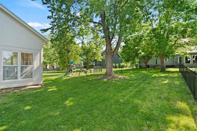 8443 Mettee St, Lenexa, KS 66219 - view of yard featuring a playground