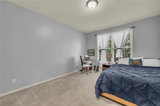 15828 W 61st St, Shawnee, KS 66217 - bedroom featuring carpet, baseboards, a textured ceiling, and an office area