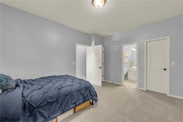 15828 W 61st St, Shawnee, KS 66217 - carpeted bedroom featuring baseboards and ensuite bath