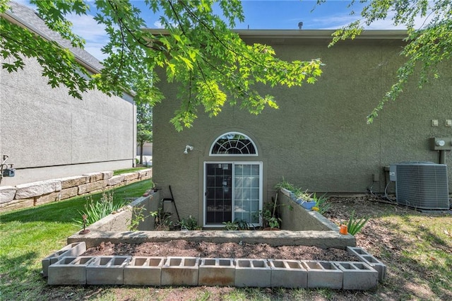 15828 W 61st St, Shawnee, KS 66217 - exterior view of central AC unit and stucco siding