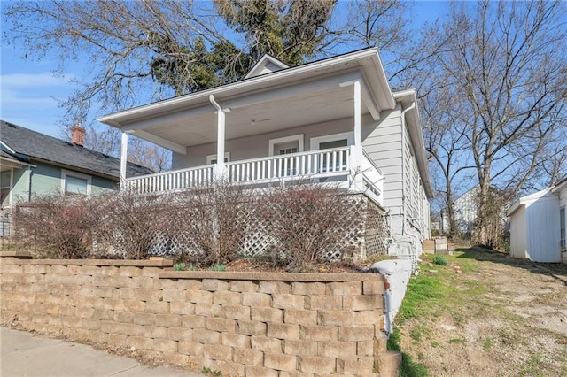 311 N Silver St, Paola, KS 66071 - view of front of house with a porch