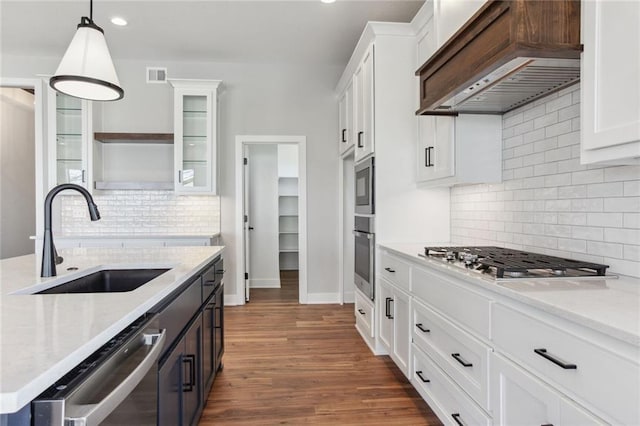 12425 NW Empress St, Platte City, MO 64079 - kitchen with custom exhaust hood, a sink, appliances with stainless steel finishes, white cabinets, and open shelves