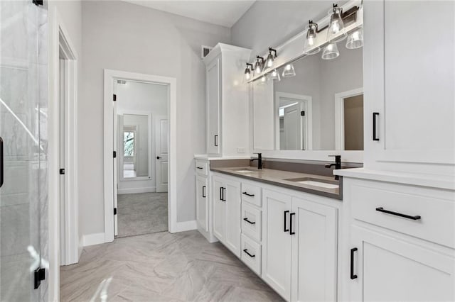 12425 NW Empress St, Platte City, MO 64079 - bathroom featuring double vanity, baseboards, and a stall shower