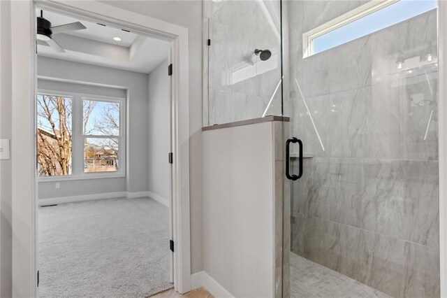 12425 NW Empress St, Platte City, MO 64079 - full bath with a shower stall, baseboards, and ceiling fan