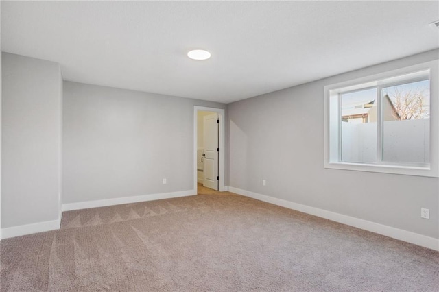 12425 NW Empress St, Platte City, MO 64079 - carpeted spare room featuring baseboards