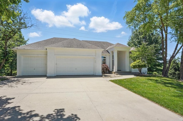 165 NE Hidden Ridge Ln, Lees Summit, MO 64064 - view of front of home with a shingled roof, a front lawn, and stucco siding