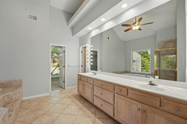 165 NE Hidden Ridge Ln, Lees Summit, MO 64064 - full bath with high vaulted ceiling, a bath, double vanity, a stall shower, and ceiling fan