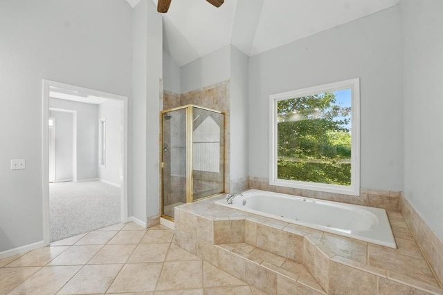 165 NE Hidden Ridge Ln, Lees Summit, MO 64064 - bathroom with a shower stall, a bath, ceiling fan, lofted ceiling, and tile patterned floors