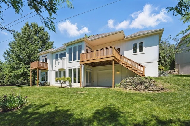 165 NE Hidden Ridge Ln, Lees Summit, MO 64064 - back of property featuring a yard, an attached garage, a wooden deck, and stairway