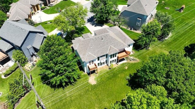 165 NE Hidden Ridge Ln, Lees Summit, MO 64064 - aerial perspective of suburban area
