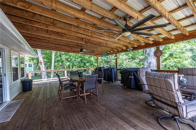 26406 Waterview Dr, Warsaw, MO 65355 - wooden terrace with a ceiling fan and outdoor dining area